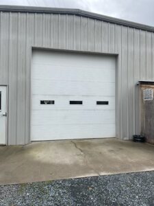 Commercial Broken spring on 12 door. 03 28A