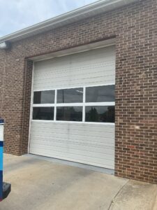 Commercial Overhead section door repair — broken spring on 12’2”x12’ door with trolley motor 06 04A