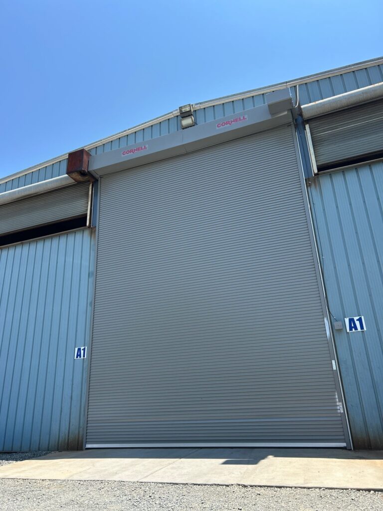 Rolling steel door repair — door stuck open in Building 10 24H